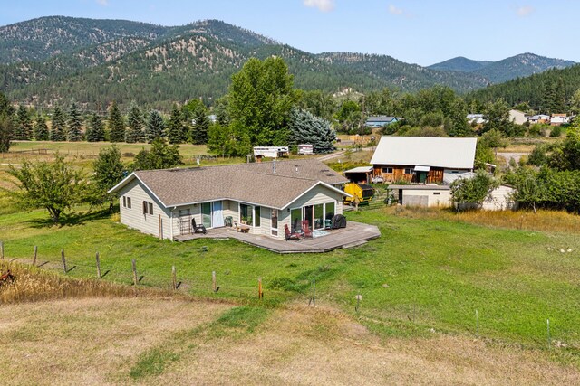 bird's eye view featuring a mountain view and a rural view