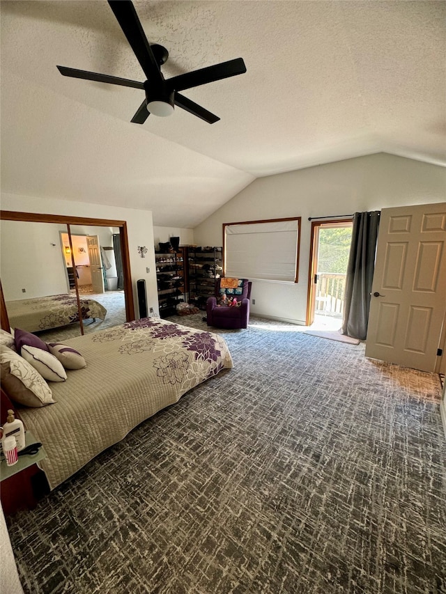 bedroom featuring ceiling fan, a textured ceiling, access to outside, and vaulted ceiling