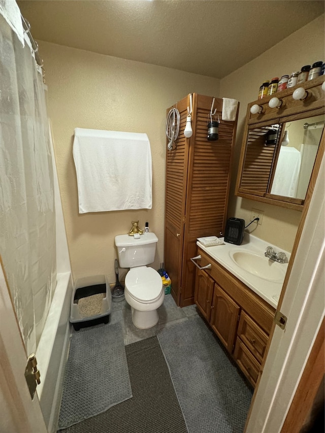 full bathroom featuring tile patterned floors, shower / bath combination with curtain, toilet, and vanity