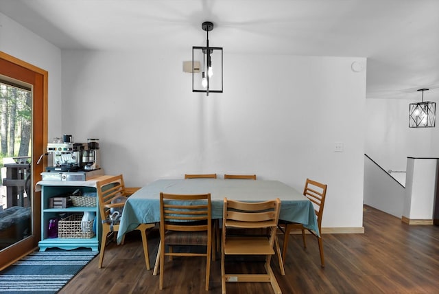 dining room with dark wood-style floors