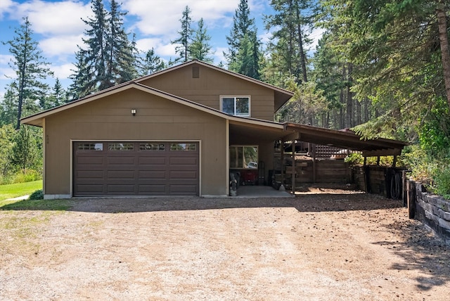 view of front of property featuring a garage and driveway