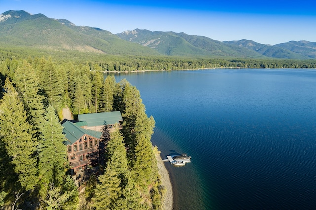 aerial view featuring a water and mountain view