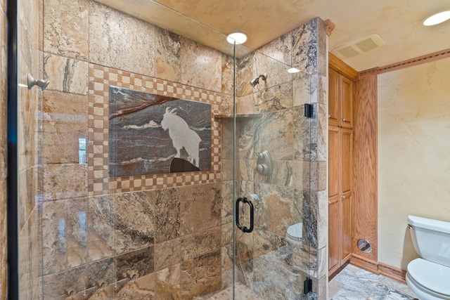 full bath featuring visible vents, a stall shower, and toilet