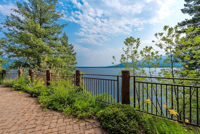 view of water feature featuring fence