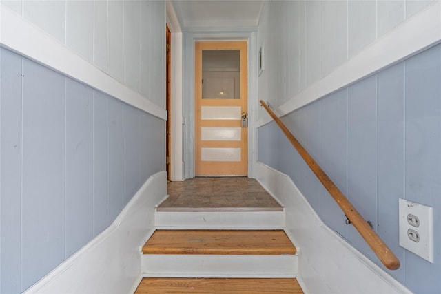 stairs with wood-type flooring