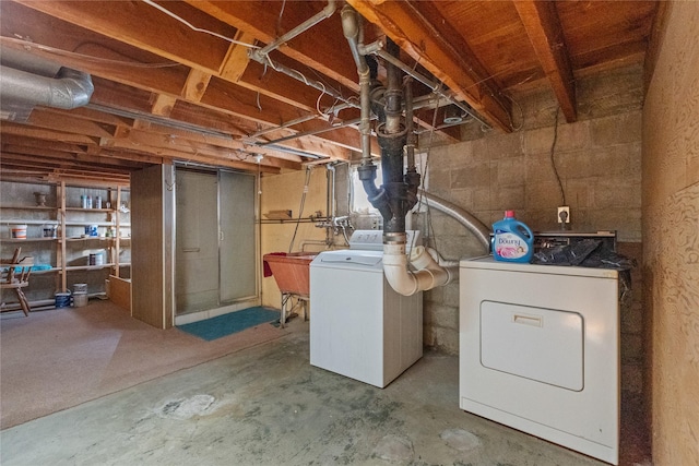 basement featuring separate washer and dryer