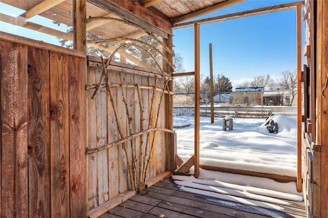 view of snow covered deck