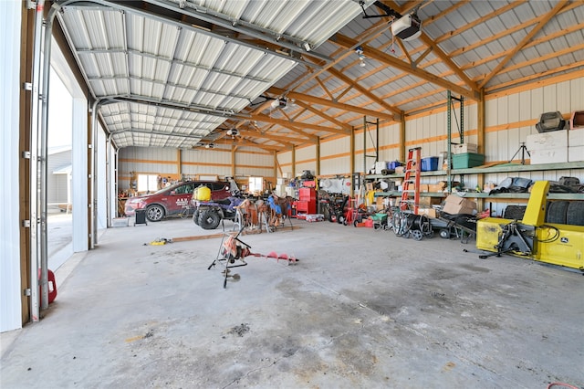 garage featuring a carport and a garage door opener