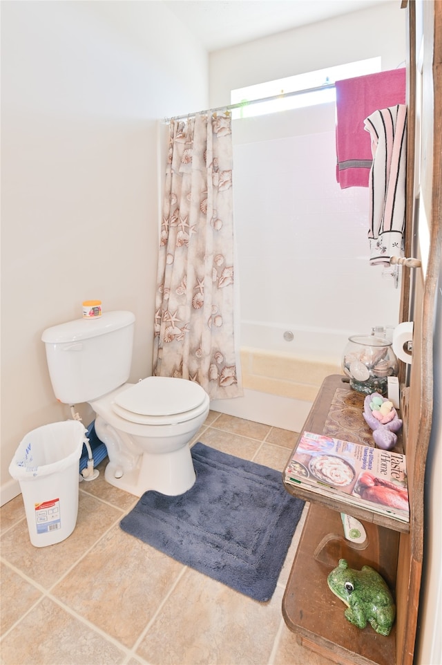 bathroom featuring tile patterned floors and toilet