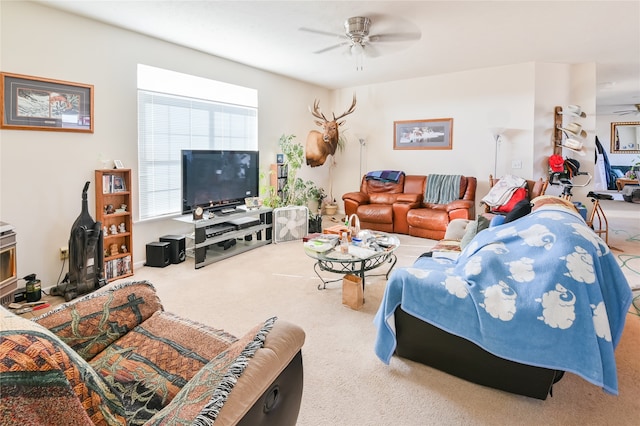 living room with carpet floors and ceiling fan