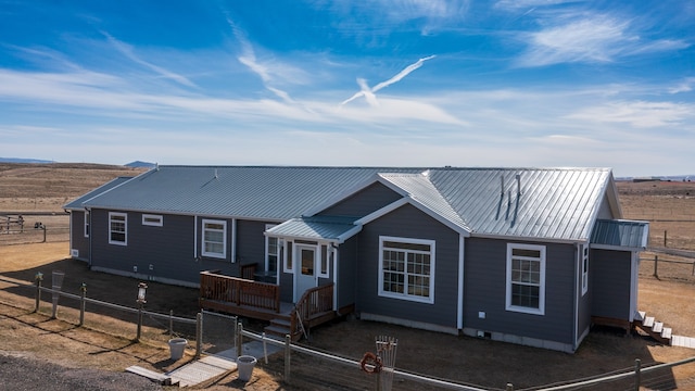 view of front of home featuring a wooden deck