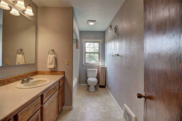 full bathroom with vanity, toilet, and bathtub / shower combination