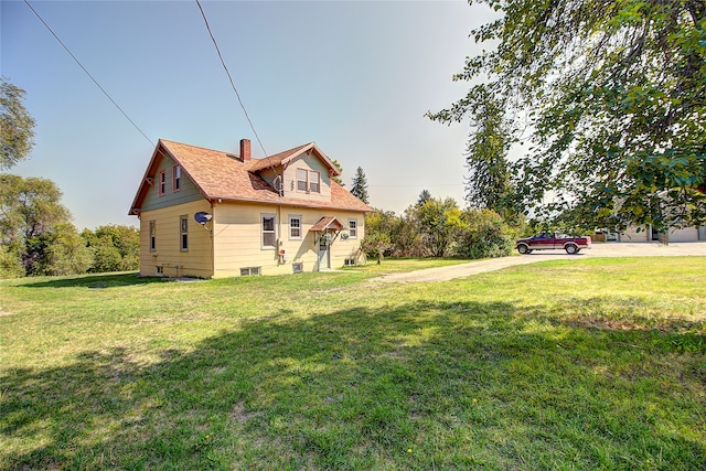 view of property exterior with a lawn