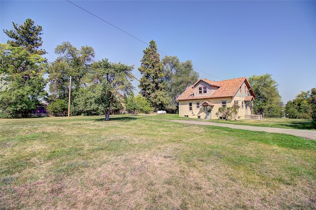 exterior space with a front yard