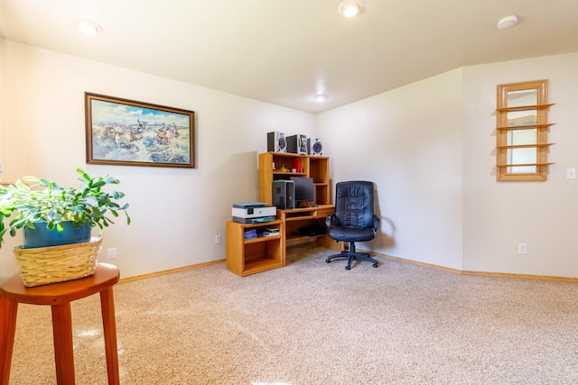 carpeted office with recessed lighting and baseboards