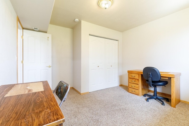 home office with carpet flooring and baseboards