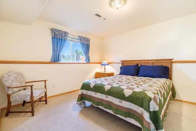 bedroom featuring carpet flooring, baseboards, and visible vents