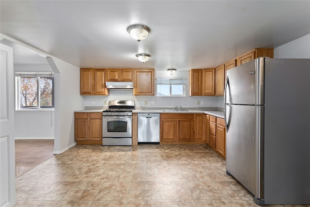 kitchen featuring stainless steel appliances and sink