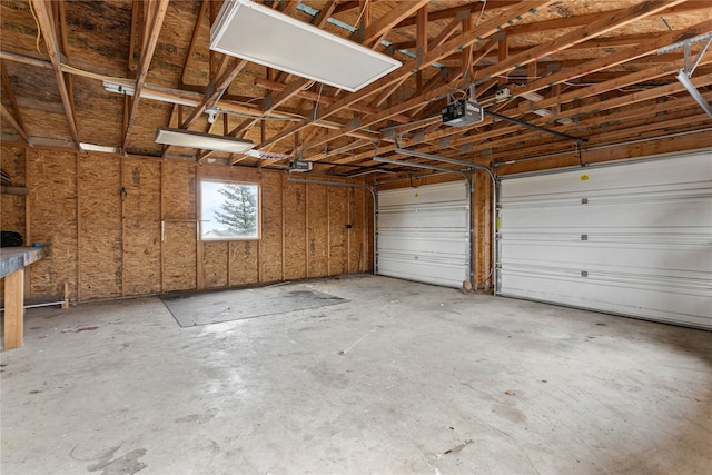 garage featuring a garage door opener