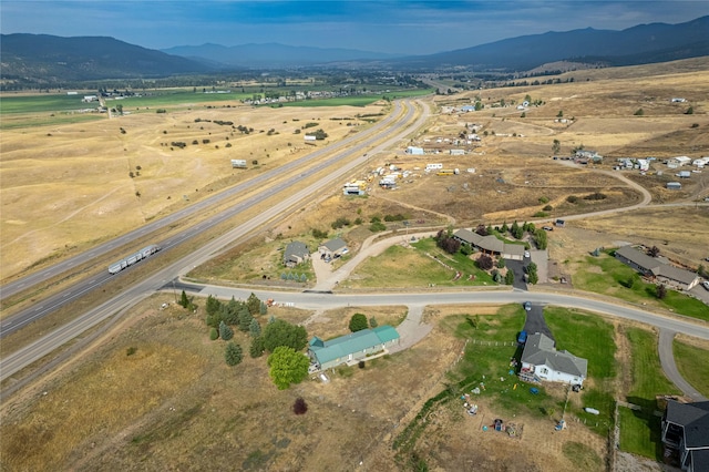 aerial view featuring a mountain view and a rural view