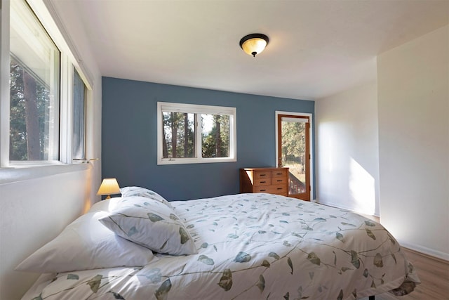 bedroom featuring wood finished floors