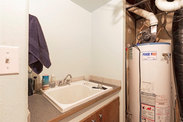 interior space with water heater and a sink