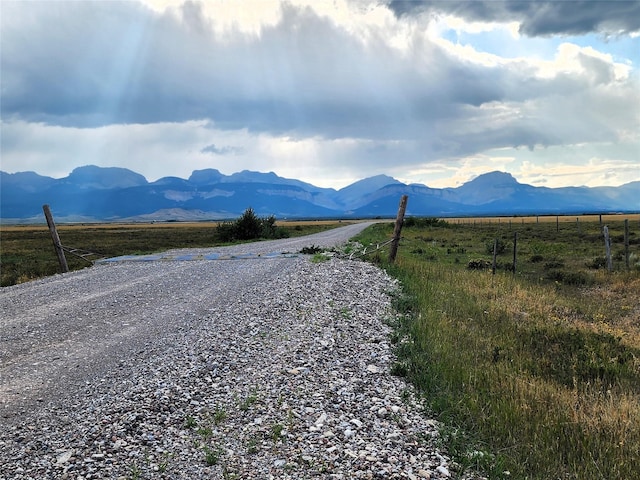 property view of mountains featuring a rural view