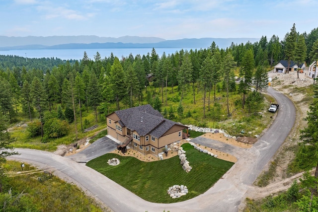 birds eye view of property featuring a mountain view