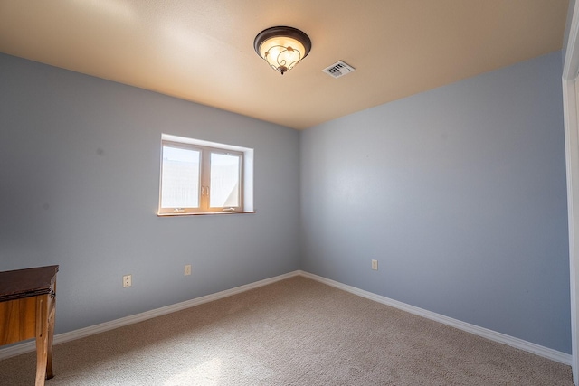 view of carpeted spare room