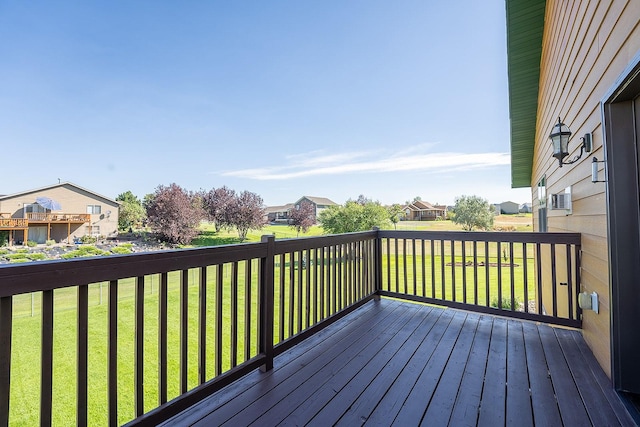 deck featuring a lawn