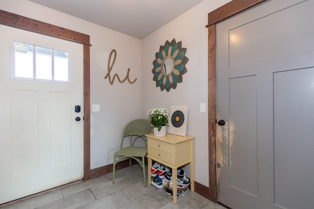 foyer with light tile patterned floors