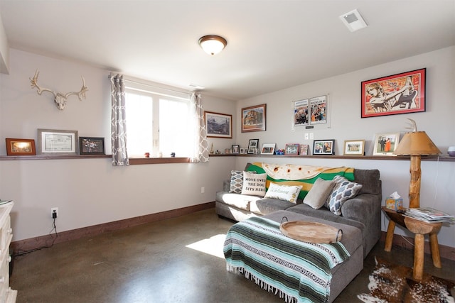 living room with concrete flooring