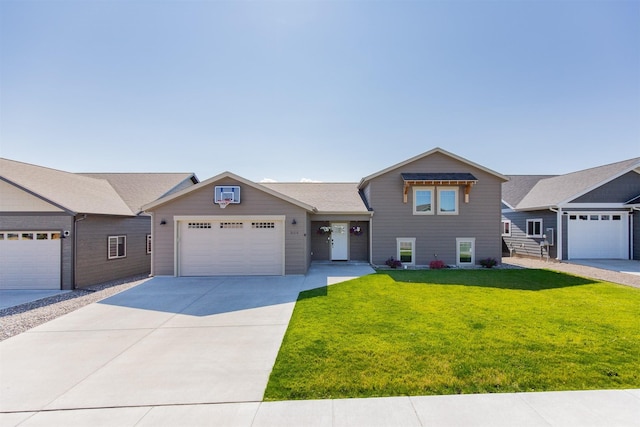 view of front facade featuring a garage and a front lawn