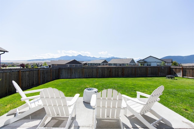 view of patio / terrace with a mountain view