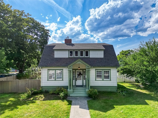 bungalow with a front yard