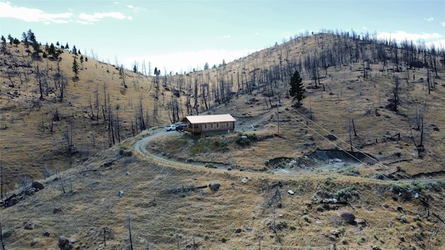 birds eye view of property featuring a rural view