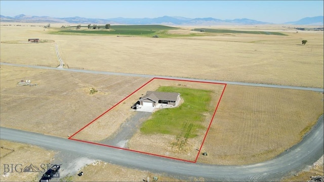 bird's eye view with a rural view and a mountain view