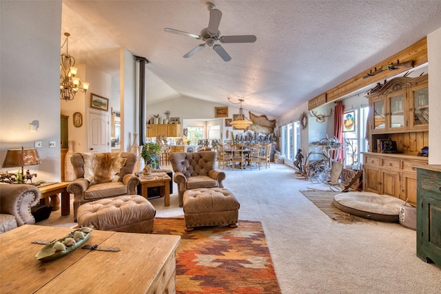 living area with lofted ceiling, plenty of natural light, carpet, and a textured ceiling