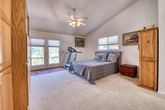 carpeted bedroom with lofted ceiling, ceiling fan, and access to outside