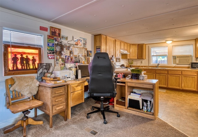 office space with a sink and light tile patterned floors