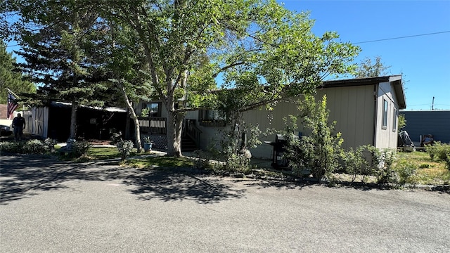 view of front of property with stairway