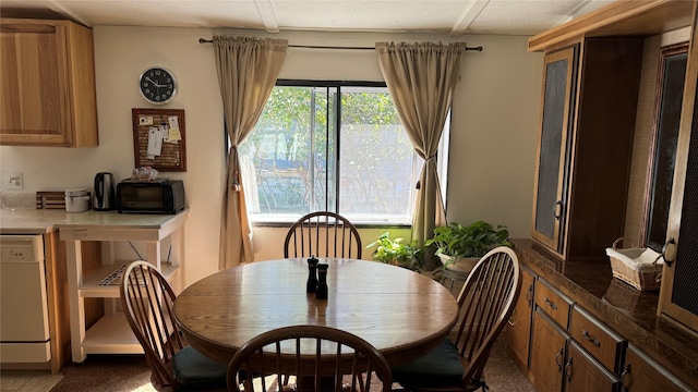 dining room with light carpet