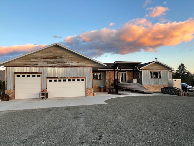 ranch-style house featuring a garage