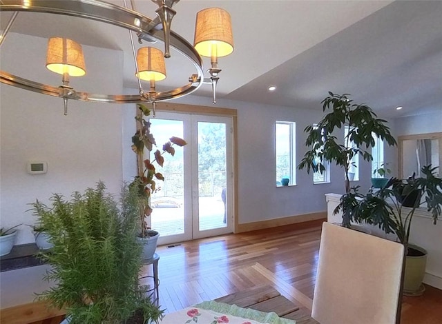5355 Peaks View Dr, Helena, MT 59602 - dining room featuring french doors, wood finished floors, baseboards, and recessed lighting