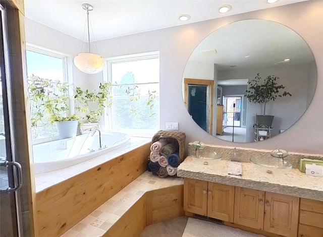 5355 Peaks View Dr, Helena, MT 59602 - bathroom with vanity, a bath, and tile patterned flooring