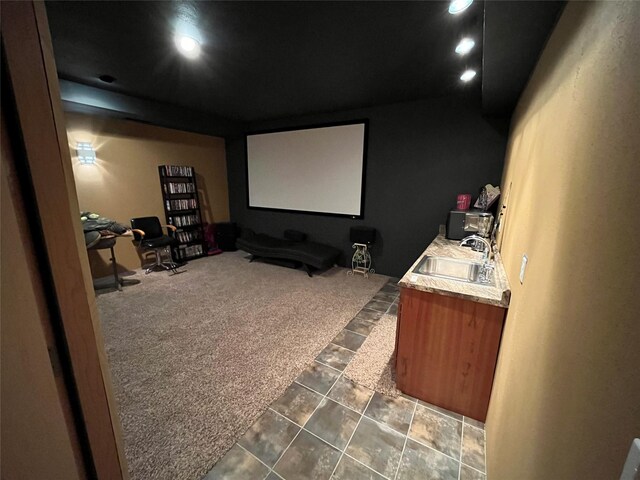 5355 Peaks View Dr, Helena, MT 59602 - home theater room with a sink, carpet flooring, tile patterned floors, and recessed lighting