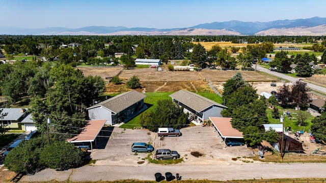 drone / aerial view featuring a mountain view