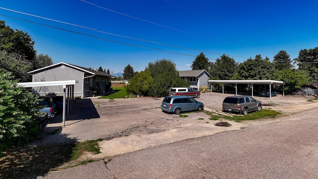 exterior space featuring a carport