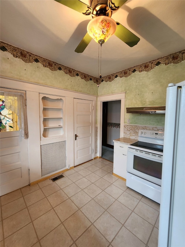 kitchen featuring built in shelves, white appliances, extractor fan, ceiling fan, and light tile patterned floors