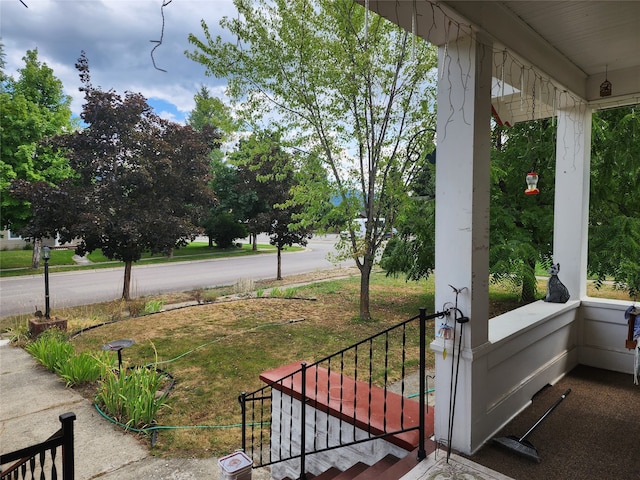 view of yard with a porch